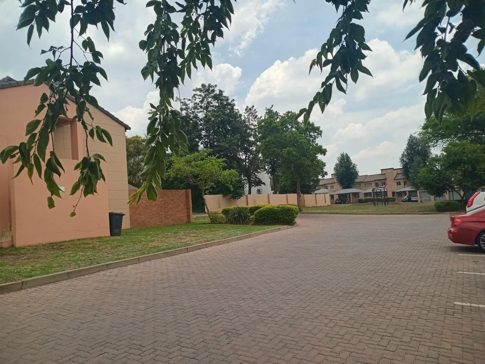 A lovely 2 bed ground apartment with  a Lockup garage in Erand Gardens, Midrand.