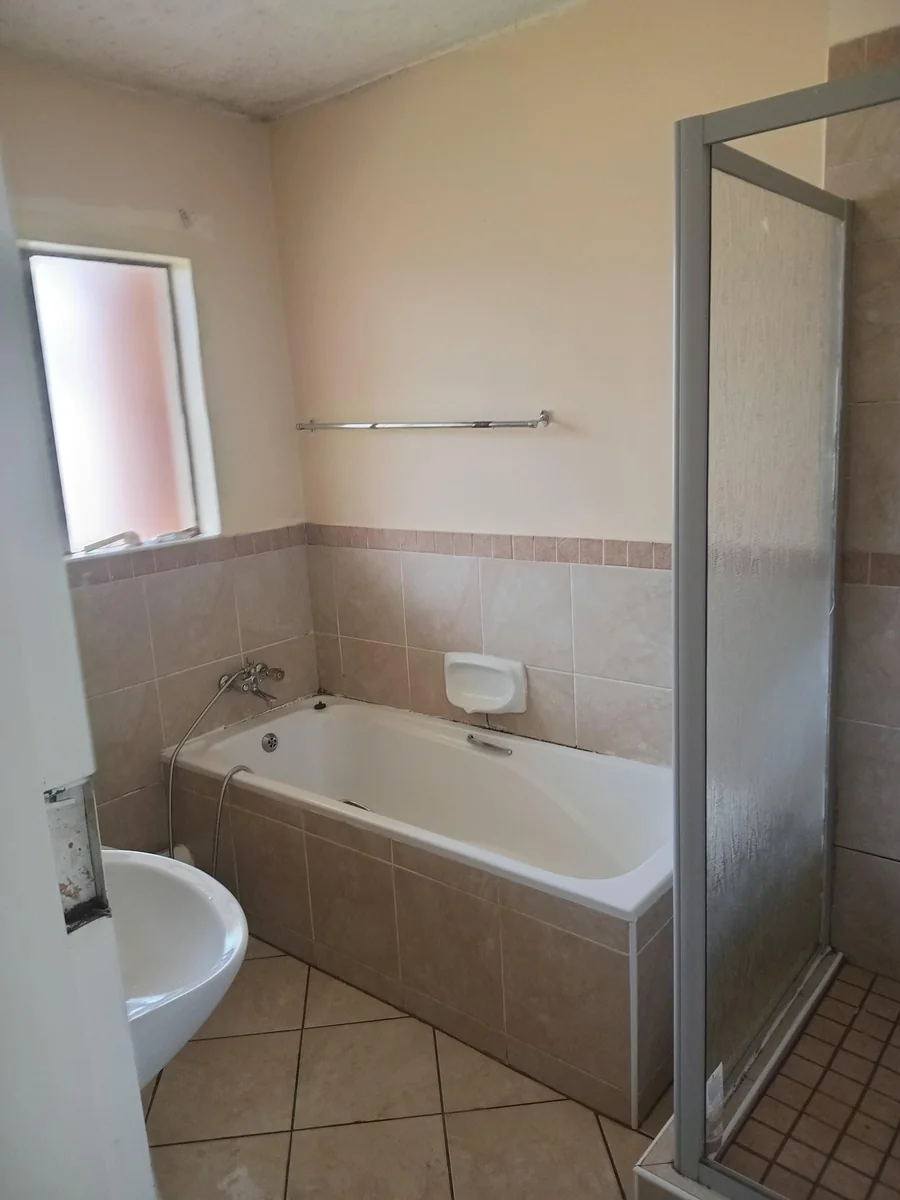 A lovely 2 bed ground apartment with  a Lockup garage in Erand Gardens, Midrand.
