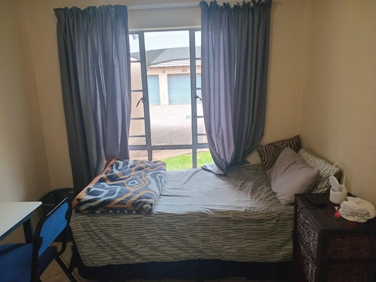 A lovely 2 bed ground apartment with  a Lockup garage in Erand Gardens, Midrand.