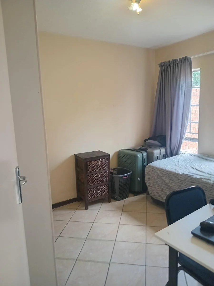 A lovely 2 bed ground apartment with  a Lockup garage in Erand Gardens, Midrand.