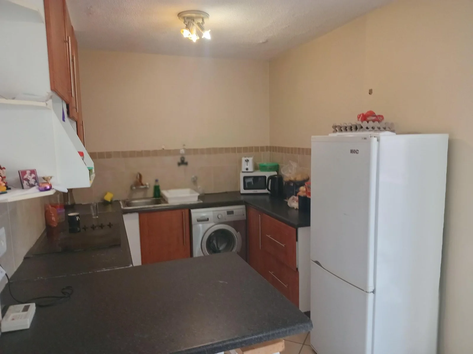 A lovely 2 bed ground apartment with  a Lockup garage in Erand Gardens, Midrand.