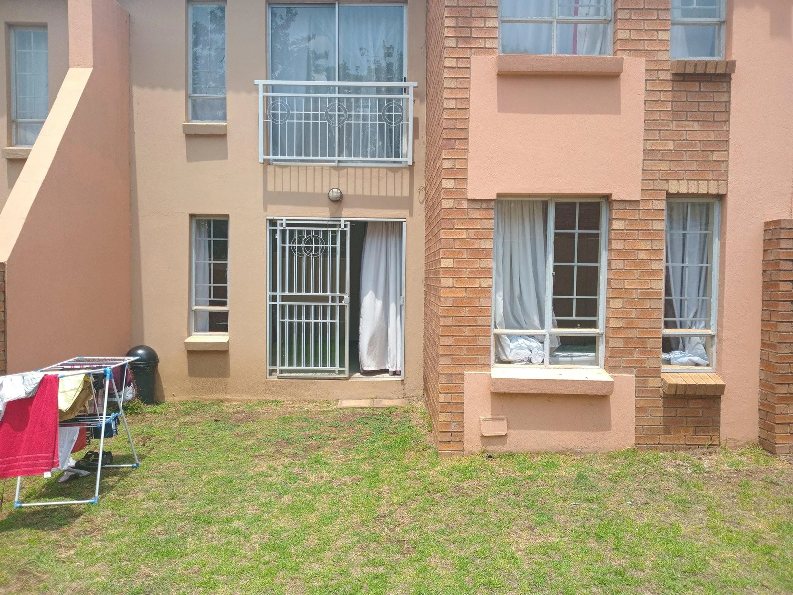 A lovely 2 bed ground apartment with  a Lockup garage in Erand Gardens, Midrand.