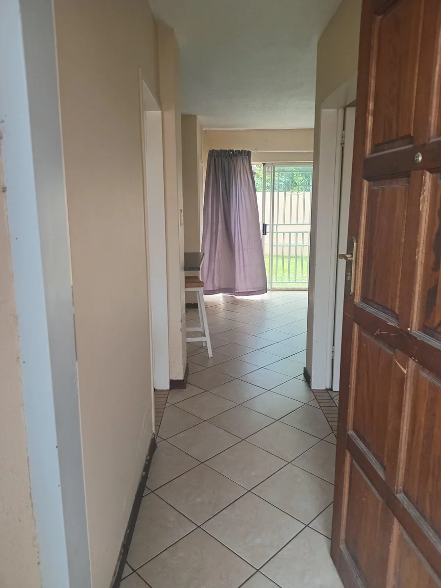 A lovely 2 bed ground apartment with  a Lockup garage in Erand Gardens, Midrand.