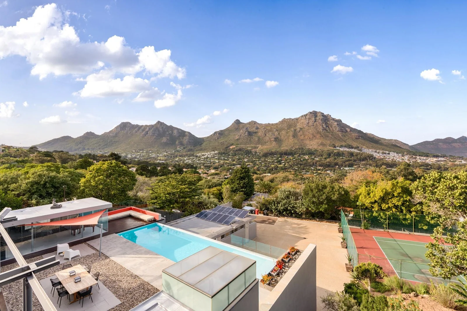 Hout Bay’s most complete family estate – tennis, cottage, solar, elevator – irreplaceable at this price.