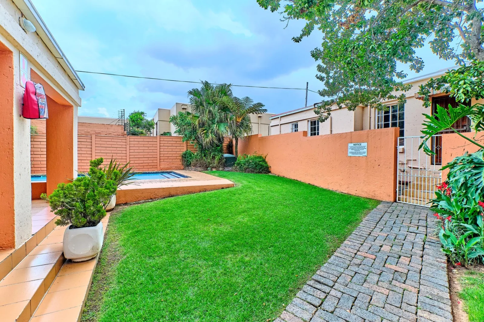 Sunlit 1-Bed Apartment with Communal Pool, Secure Access & Covered Parking for sale in Weltevreden Park