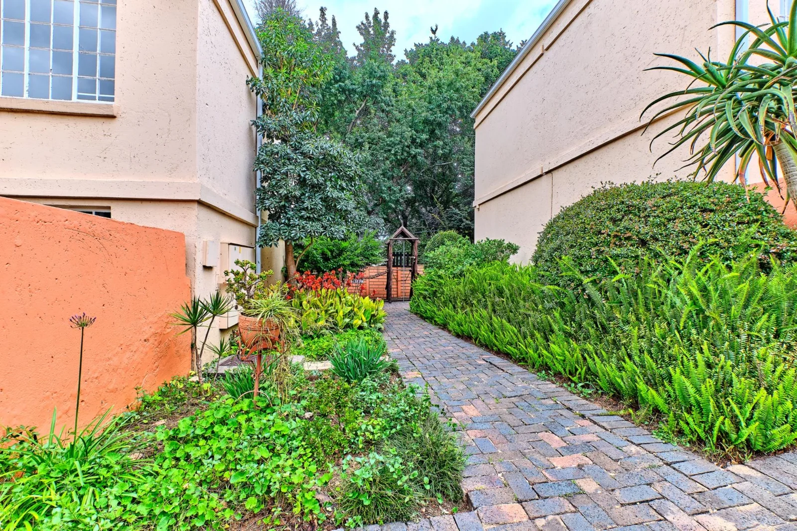 Sunlit 1-Bed Apartment with Communal Pool, Secure Access & Covered Parking for sale in Weltevreden Park