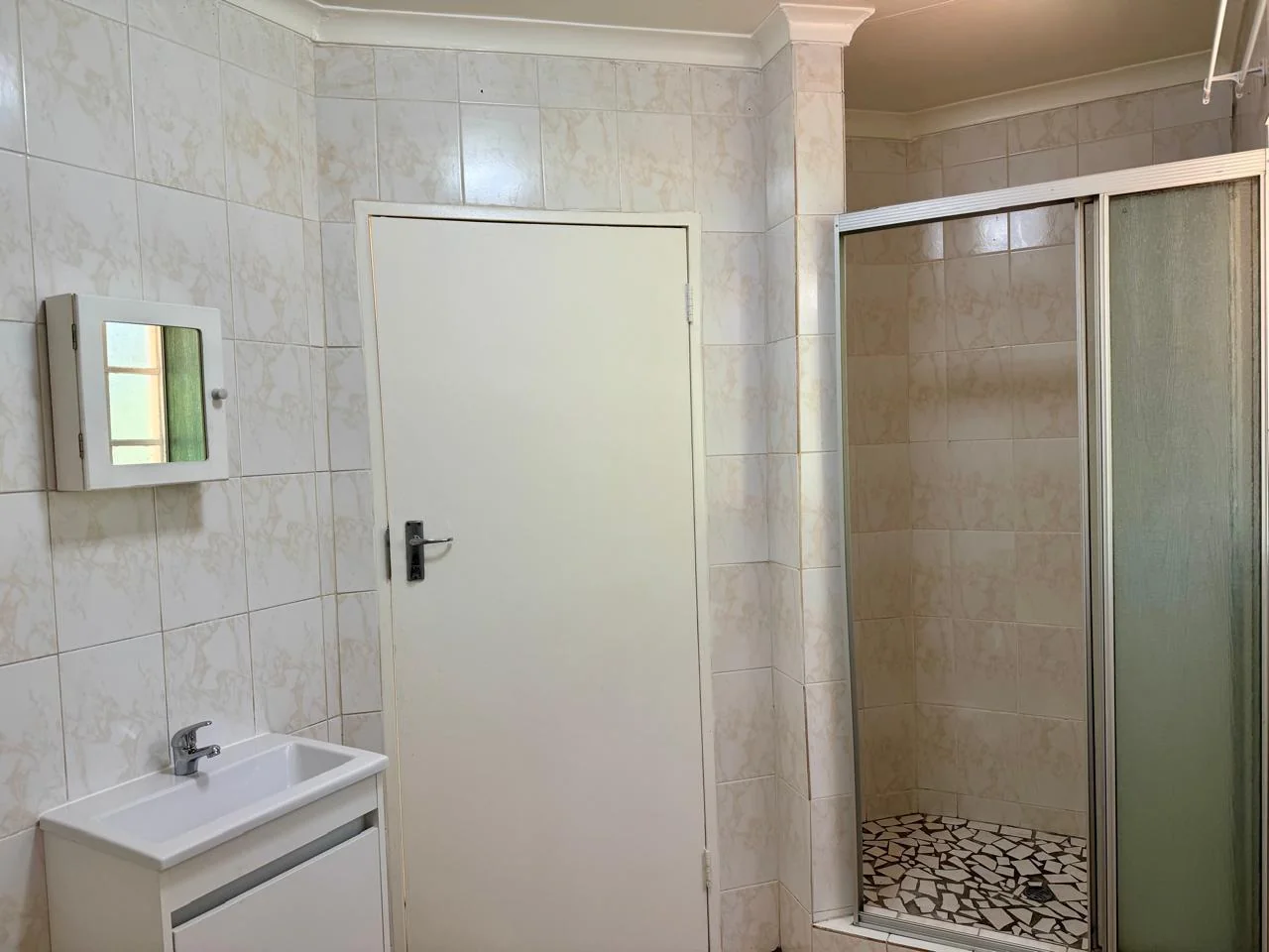 Sunlit 1-Bed Apartment with Communal Pool, Secure Access & Covered Parking for sale in Weltevreden Park