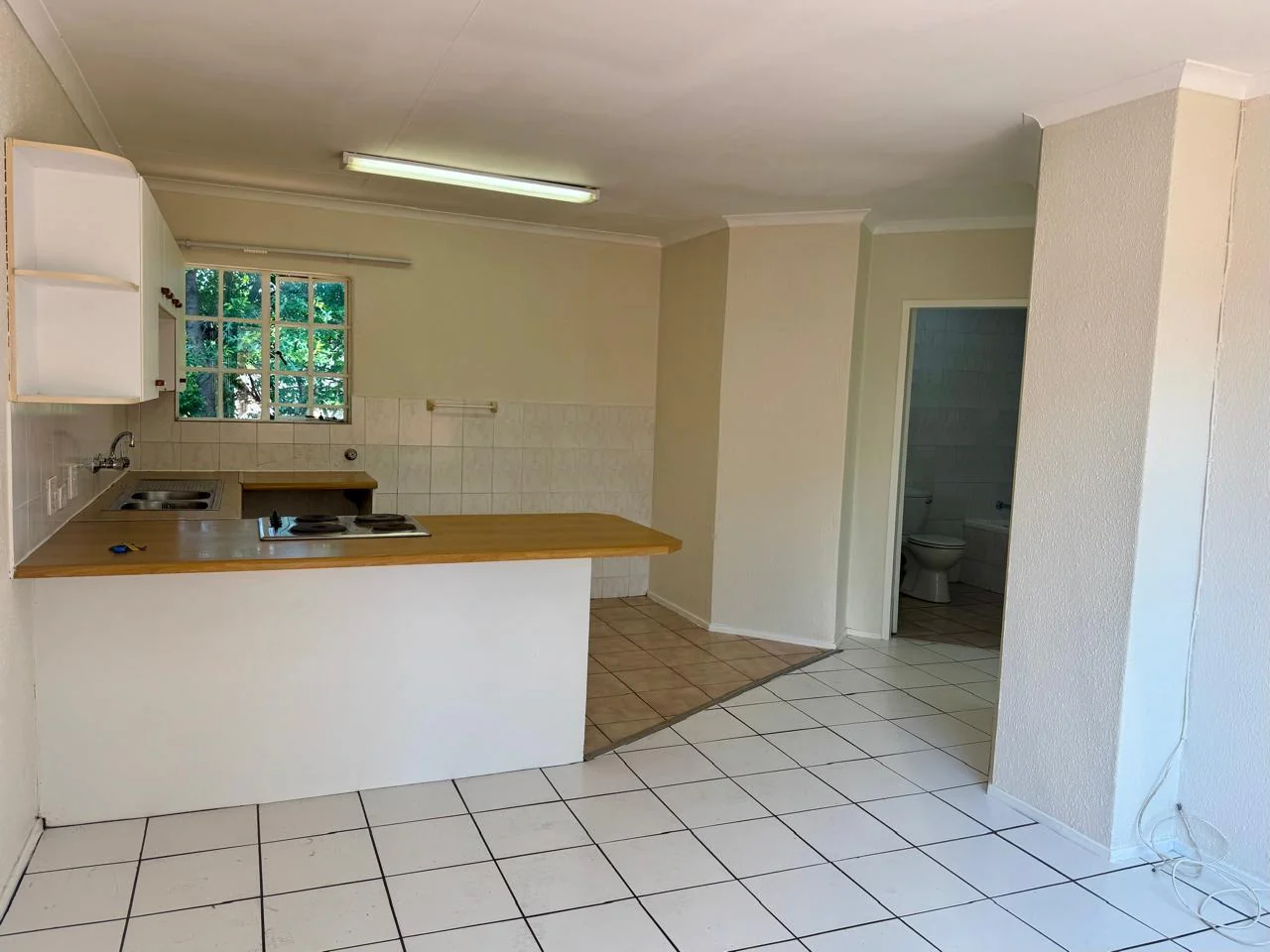Sunlit 1-Bed Apartment with Communal Pool, Secure Access & Covered Parking for sale in Weltevreden Park