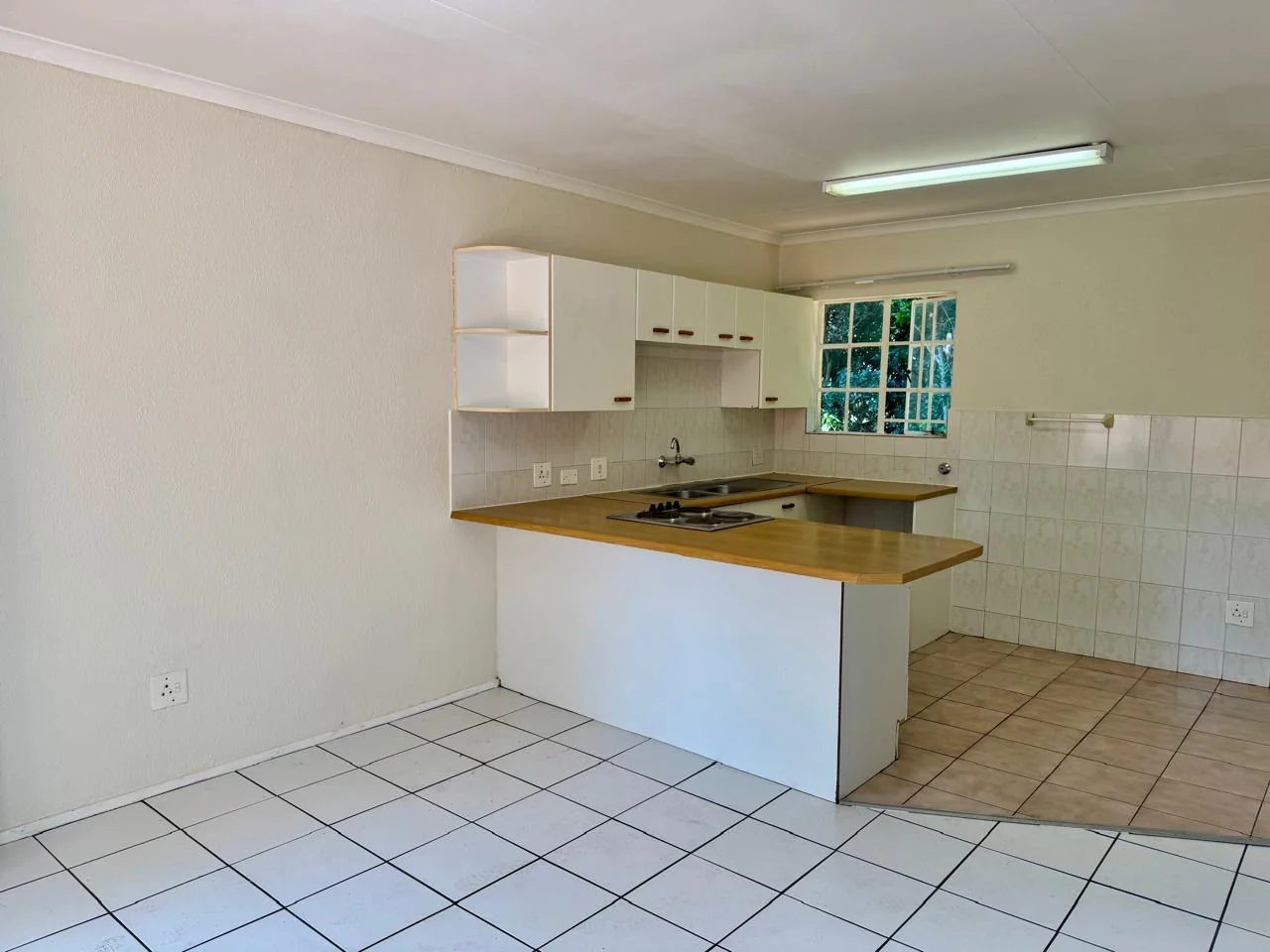 Sunlit 1-Bed Apartment with Communal Pool, Secure Access & Covered Parking for sale in Weltevreden Park