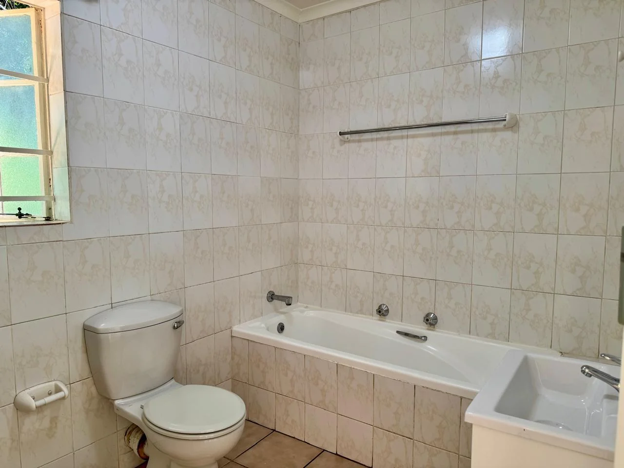 Sunlit 1-Bed Apartment with Communal Pool, Secure Access & Covered Parking for sale in Weltevreden Park