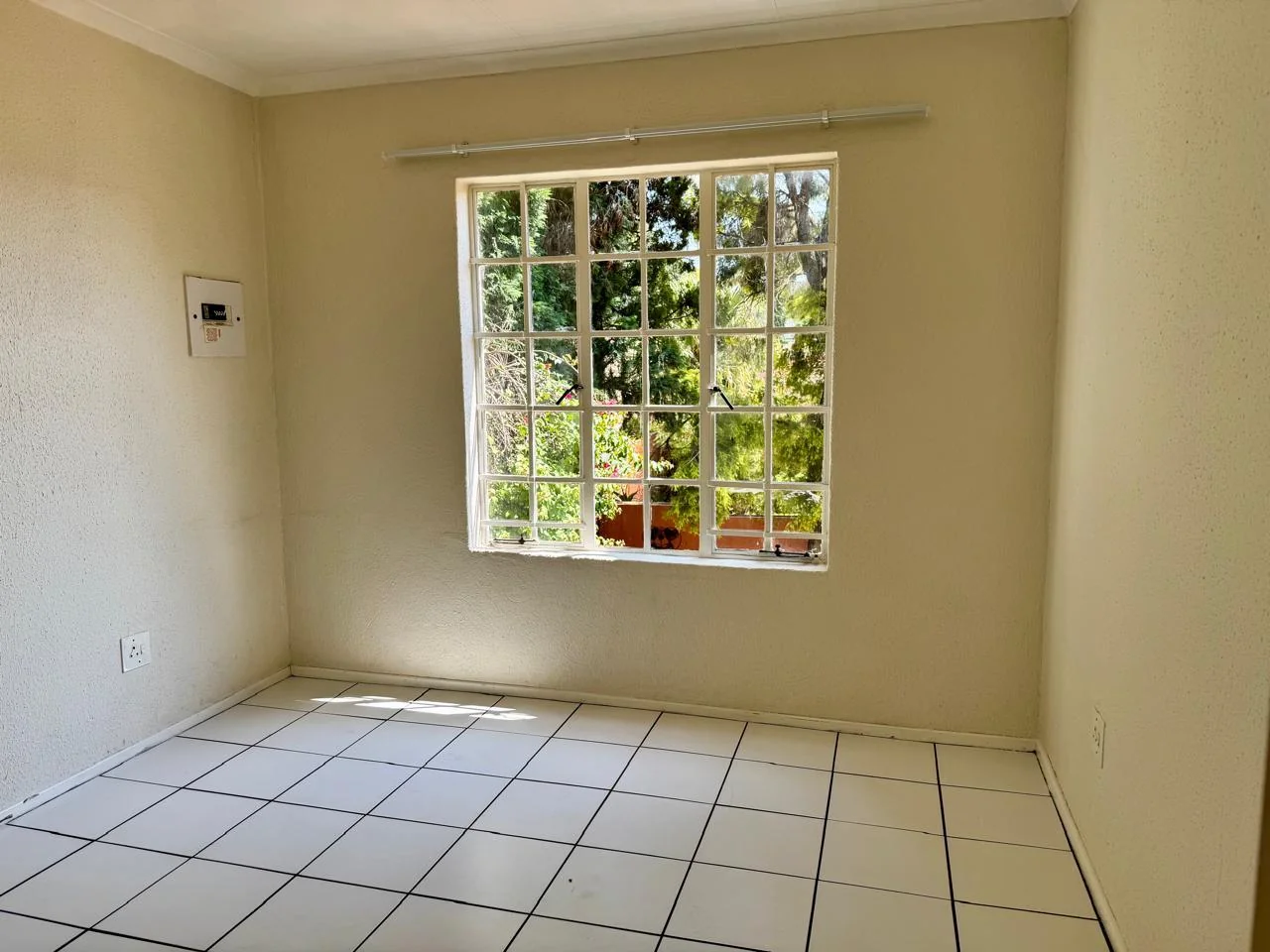 Sunlit 1-Bed Apartment with Communal Pool, Secure Access & Covered Parking for sale in Weltevreden Park