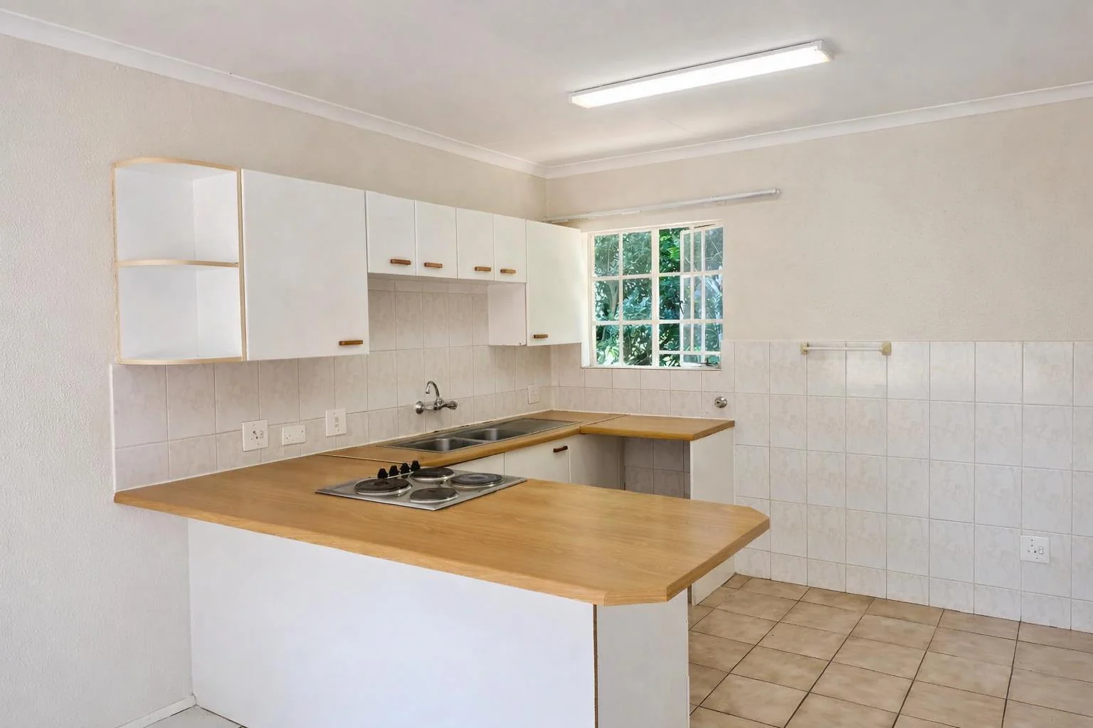 Sunlit 1-Bed Apartment with Communal Pool, Secure Access & Covered Parking for sale in Weltevreden Park