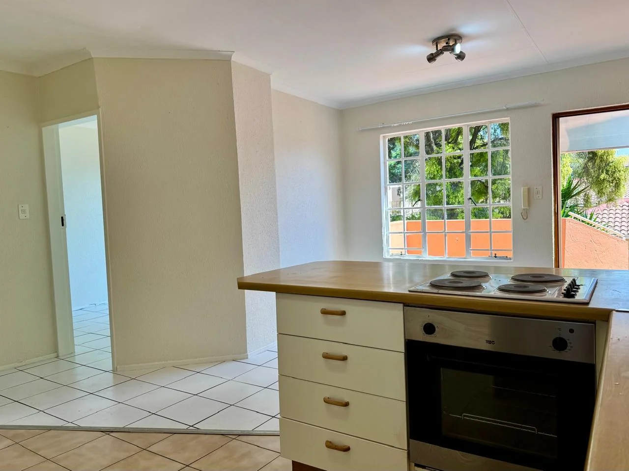 Sunlit 1-Bed Apartment with Communal Pool, Secure Access & Covered Parking for sale in Weltevreden Park