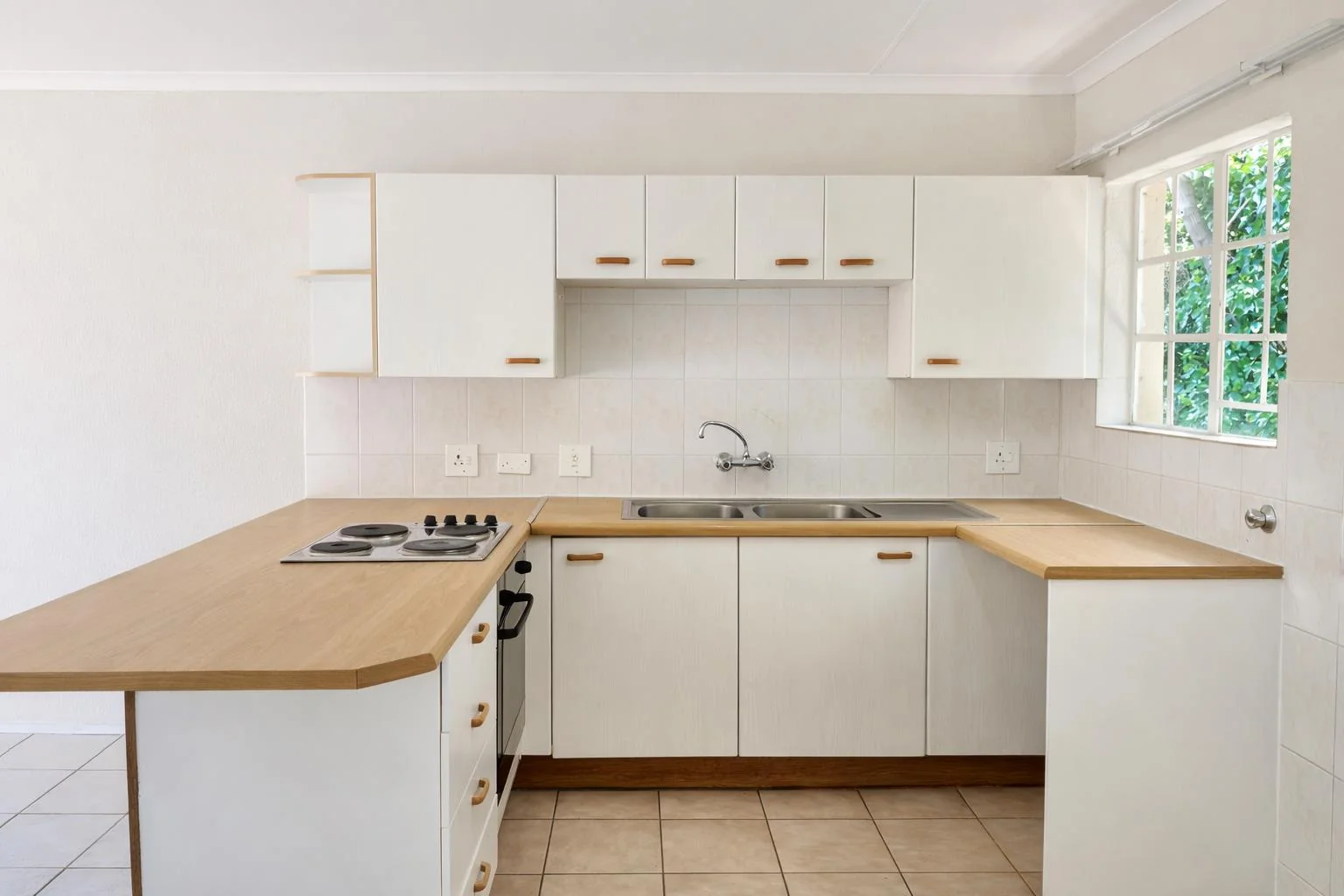 Sunlit 1-Bed Apartment with Communal Pool, Secure Access & Covered Parking for sale in Weltevreden Park