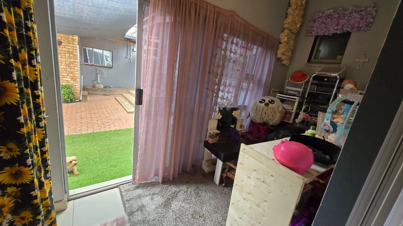 Spacious 8-Bedroom Investment Home with Flatlets and Wooden Houses