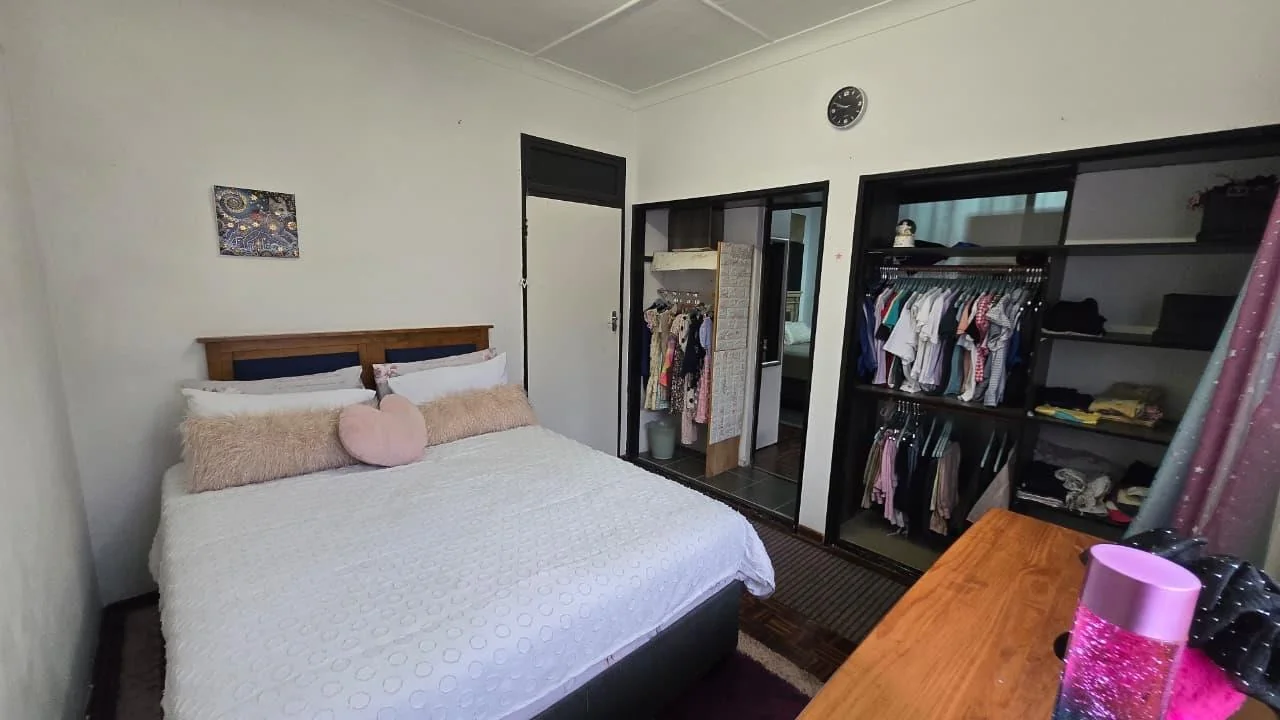 Spacious 8-Bedroom Investment Home with Flatlets and Wooden Houses