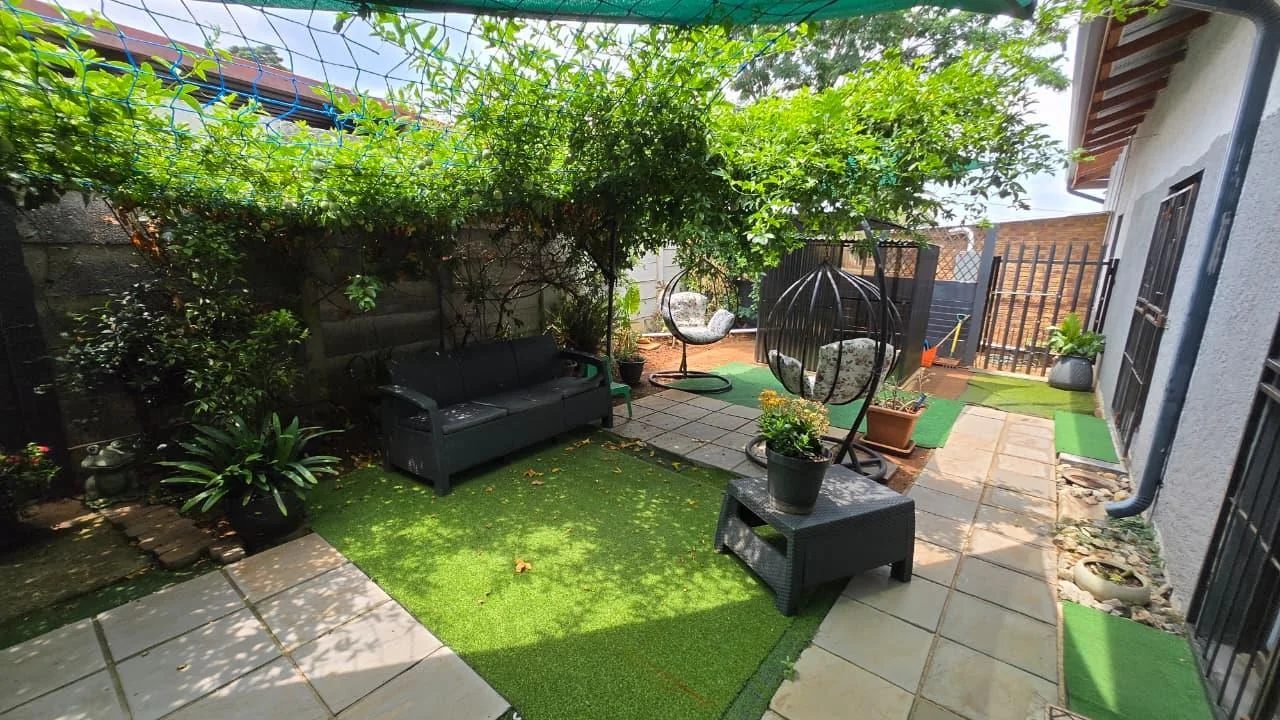 Spacious 8-Bedroom Investment Home with Flatlets and Wooden Houses