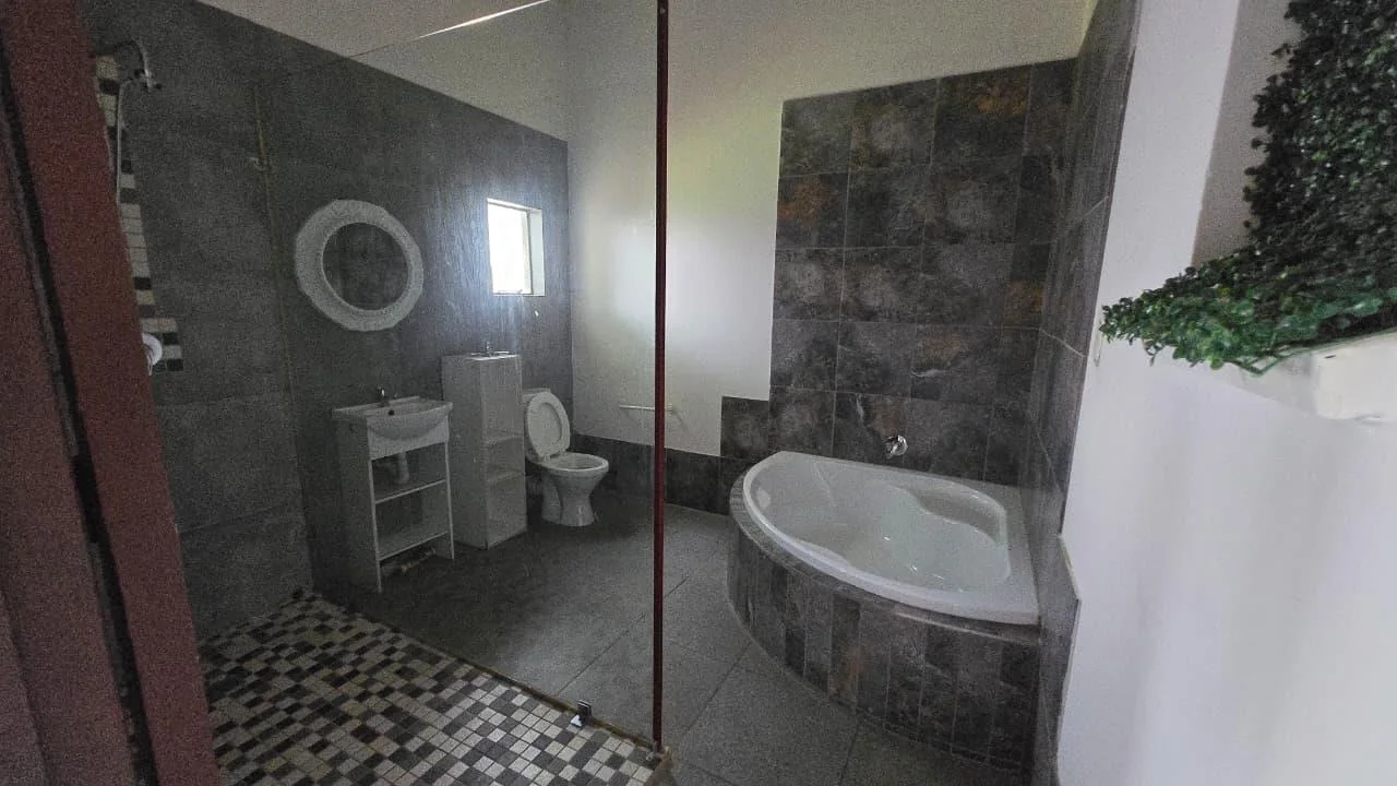 Spacious 8-Bedroom Investment Home with Flatlets and Wooden Houses