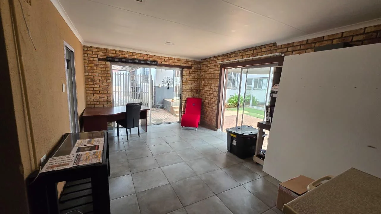 Spacious 8-Bedroom Investment Home with Flatlets and Wooden Houses