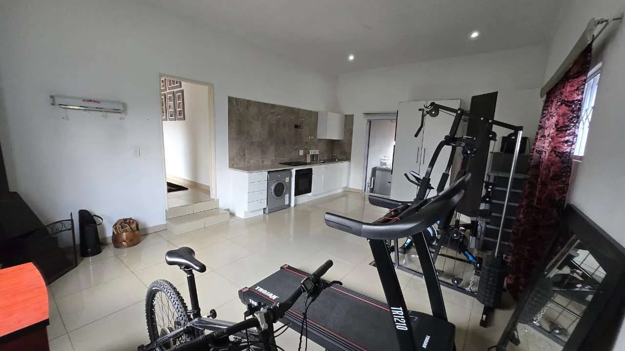 Spacious 8-Bedroom Investment Home with Flatlets and Wooden Houses