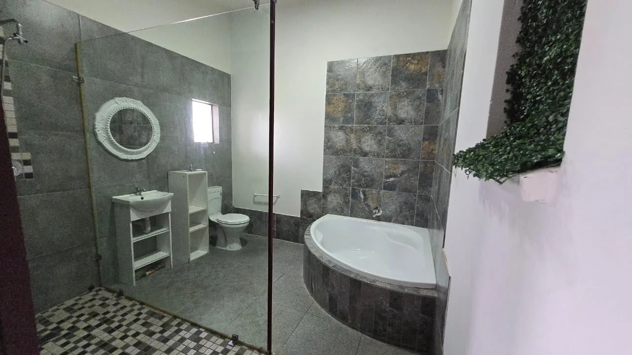 Spacious 8-Bedroom Investment Home with Flatlets and Wooden Houses