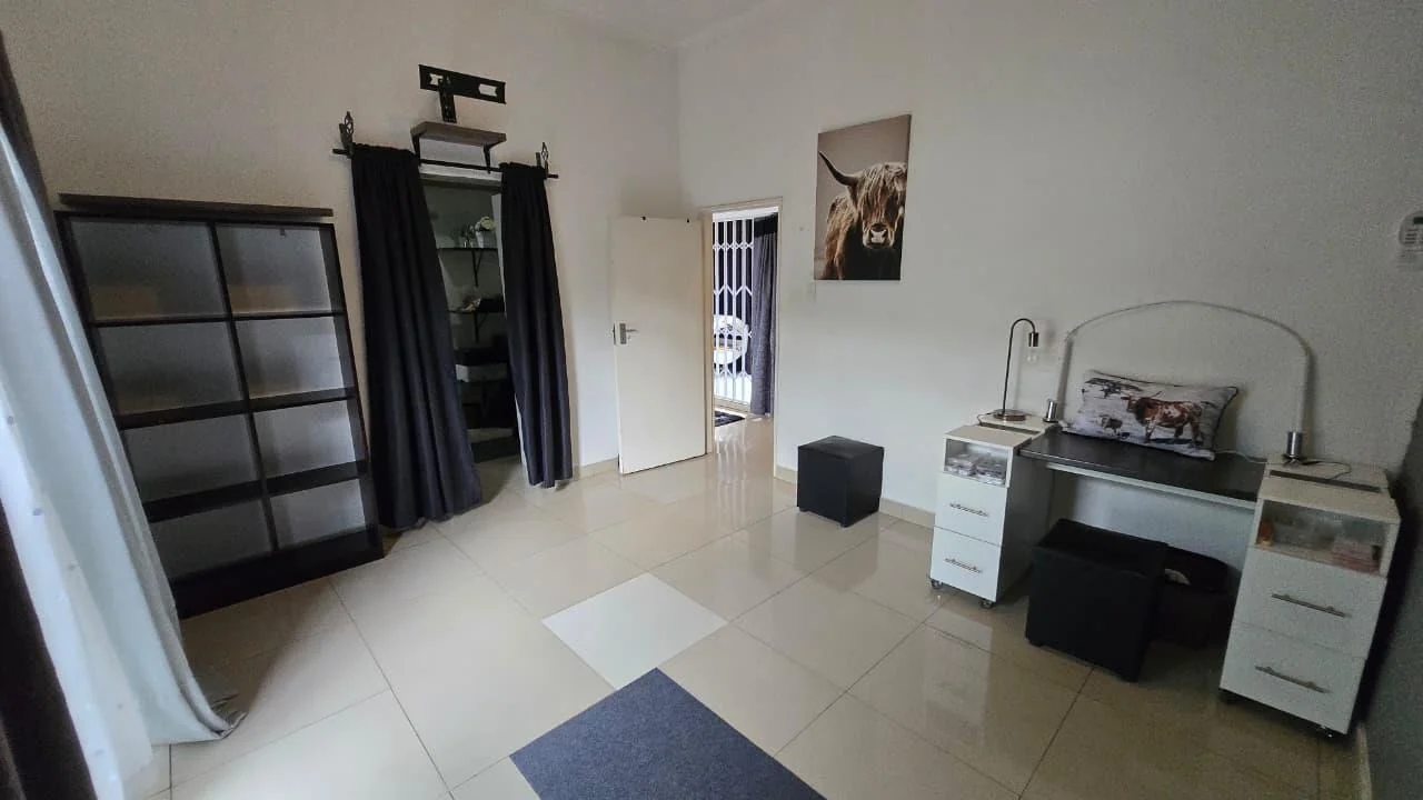 Spacious 8-Bedroom Investment Home with Flatlets and Wooden Houses