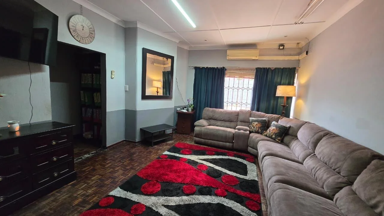 Spacious 8-Bedroom Investment Home with Flatlets and Wooden Houses