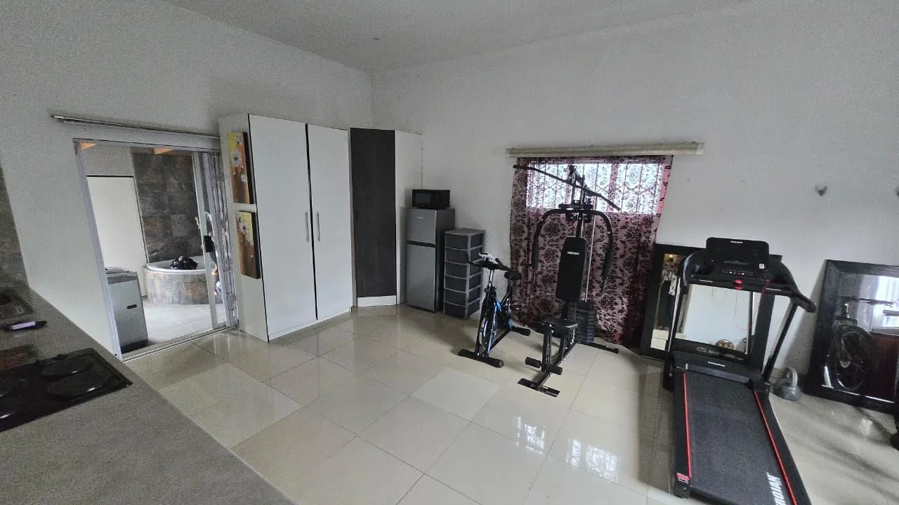 Spacious 8-Bedroom Investment Home with Flatlets and Wooden Houses