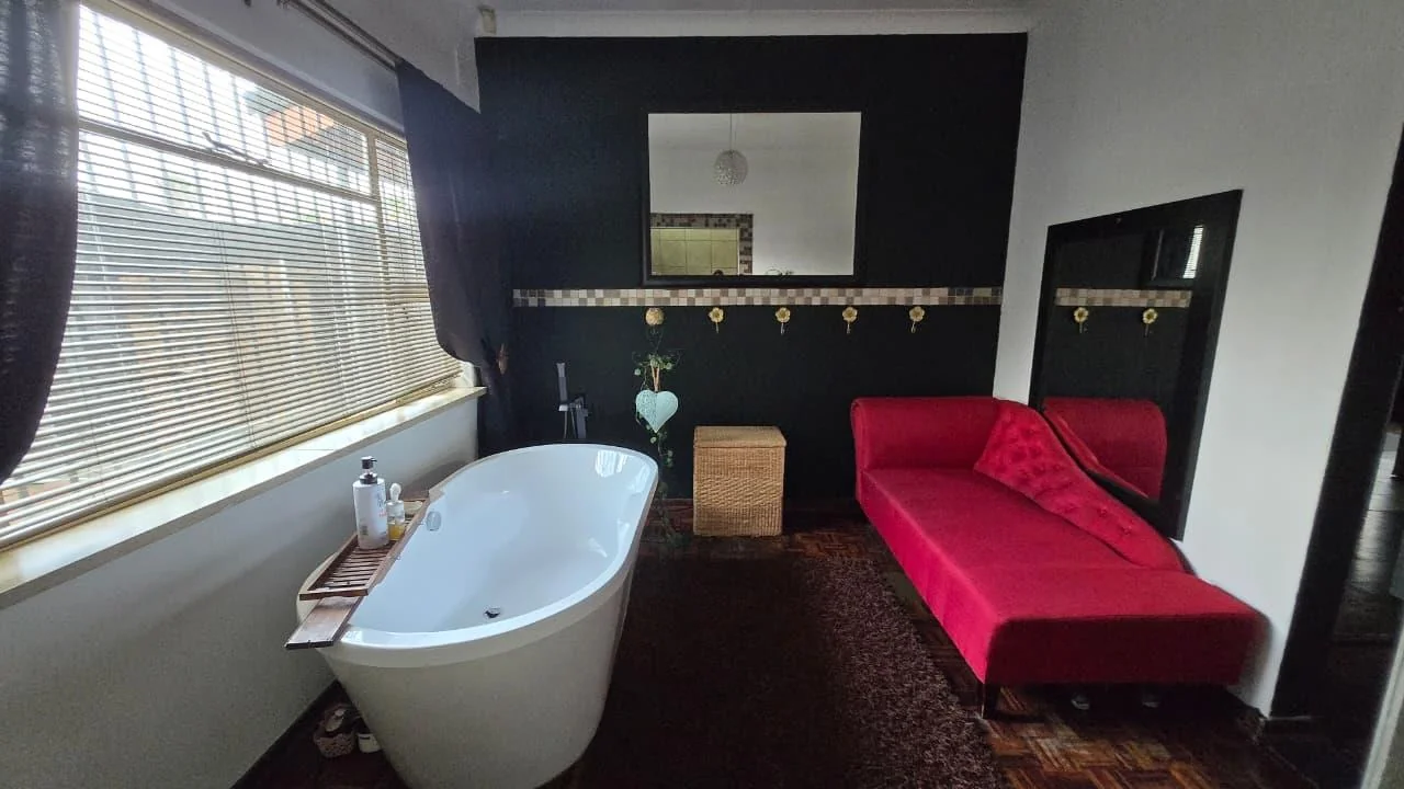 Spacious 8-Bedroom Investment Home with Flatlets and Wooden Houses