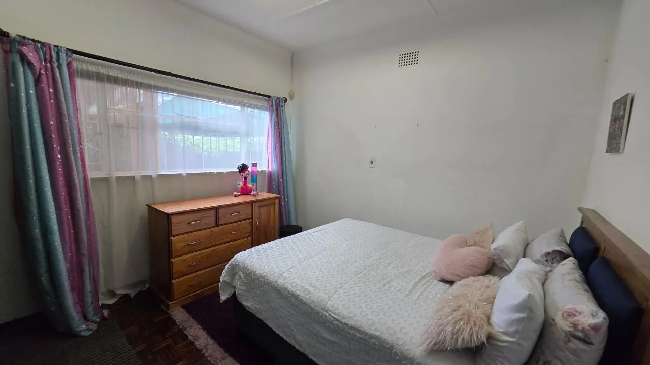 Spacious 8-Bedroom Investment Home with Flatlets and Wooden Houses