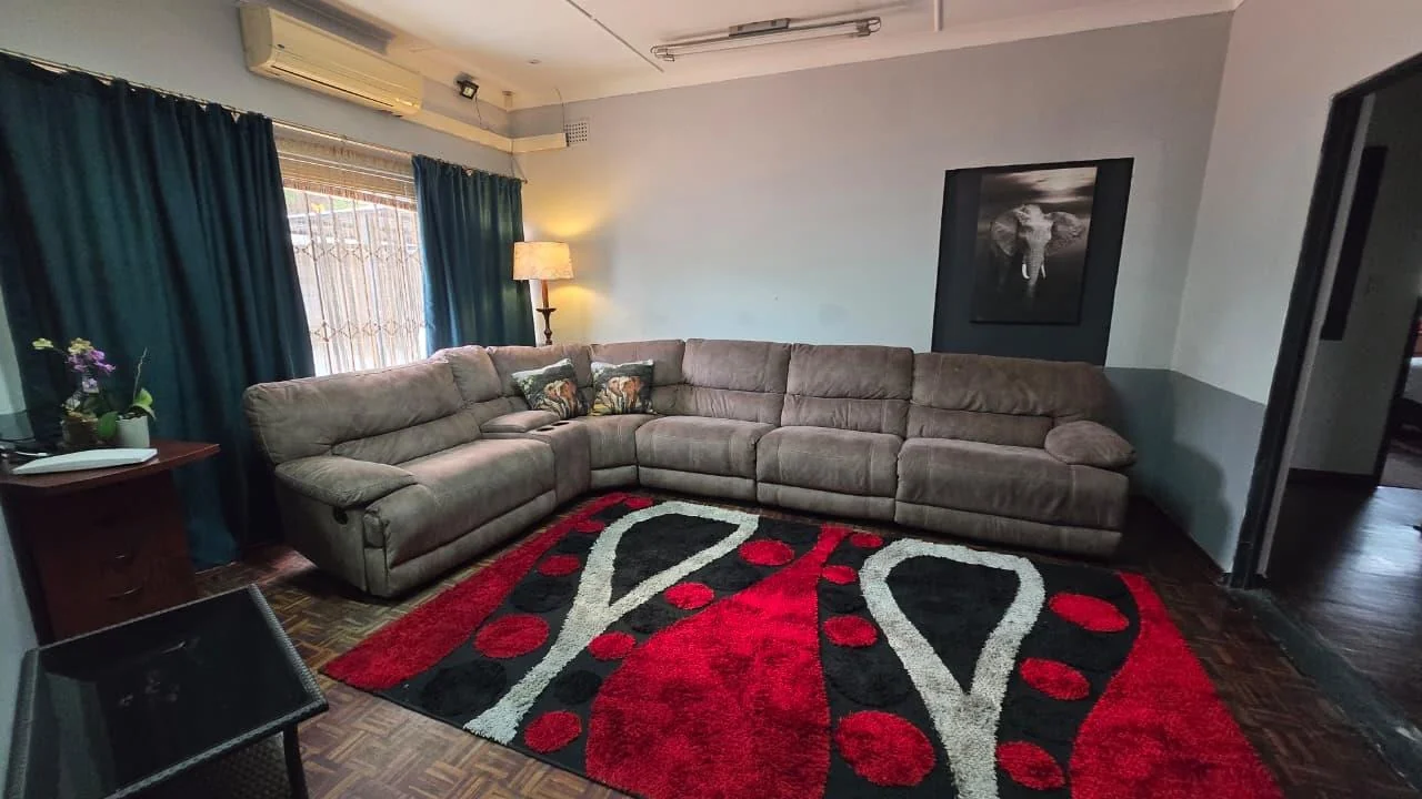 Spacious 8-Bedroom Investment Home with Flatlets and Wooden Houses