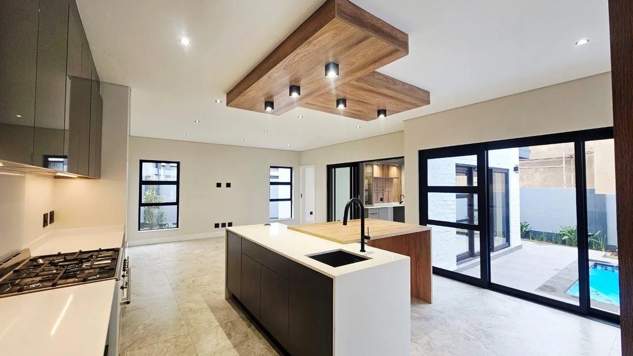 TURNKEY HOME WITH 3 GARAGES  AVAILABLE IN THE NEW DEVELOPING FOUNTAINBROOK ESTATE.