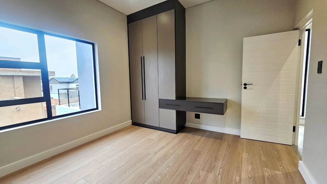 TURNKEY HOME WITH 3 GARAGES  AVAILABLE IN THE NEW DEVELOPING FOUNTAINBROOK ESTATE.