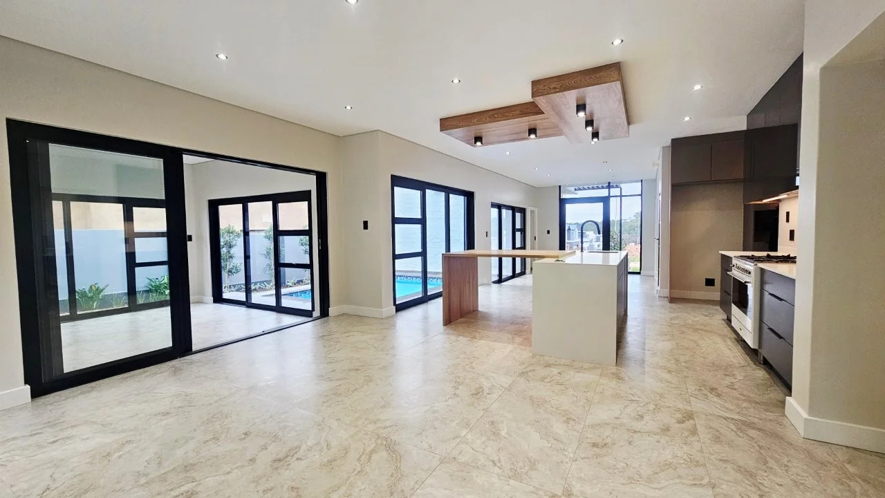 TURNKEY HOME WITH 3 GARAGES  AVAILABLE IN THE NEW DEVELOPING FOUNTAINBROOK ESTATE.