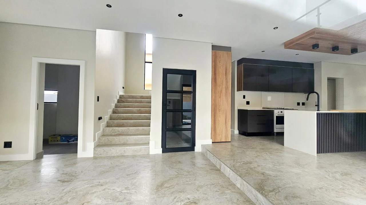 TURNKEY HOME WITH 3 GARAGES  AVAILABLE IN THE NEW DEVELOPING FOUNTAINBROOK ESTATE.