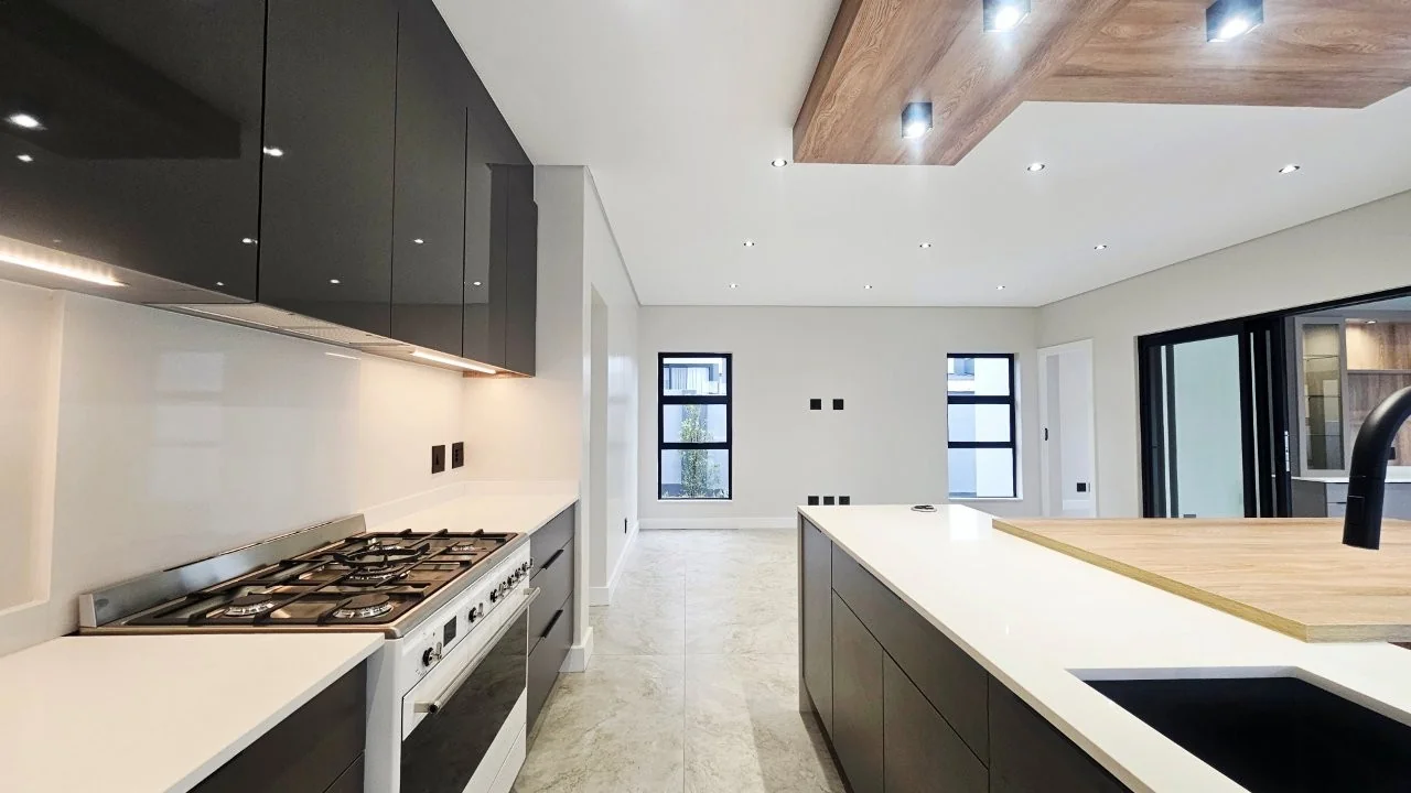 TURNKEY HOME WITH 3 GARAGES  AVAILABLE IN THE NEW DEVELOPING FOUNTAINBROOK ESTATE.