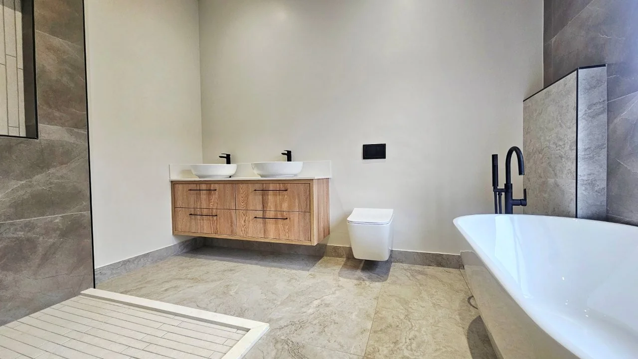 TURNKEY HOME WITH 3 GARAGES  AVAILABLE IN THE NEW DEVELOPING FOUNTAINBROOK ESTATE.