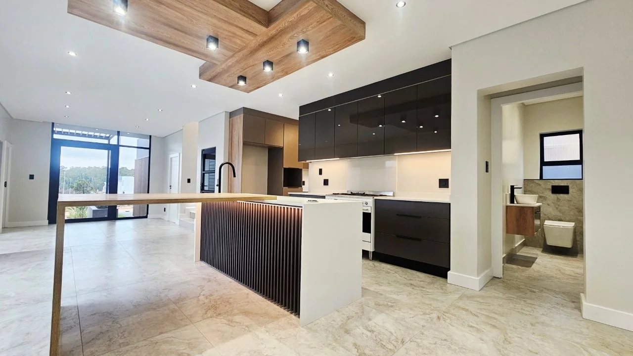 TURNKEY HOME WITH 3 GARAGES  AVAILABLE IN THE NEW DEVELOPING FOUNTAINBROOK ESTATE.