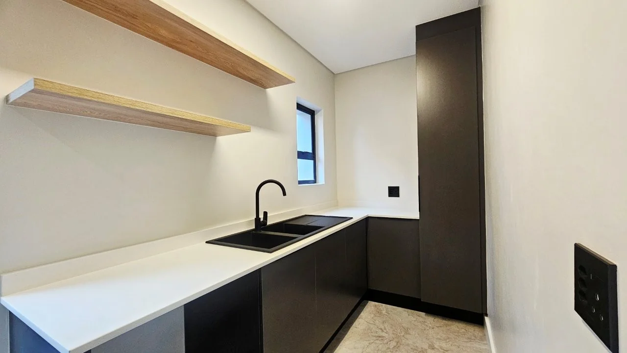 TURNKEY HOME WITH 3 GARAGES  AVAILABLE IN THE NEW DEVELOPING FOUNTAINBROOK ESTATE.