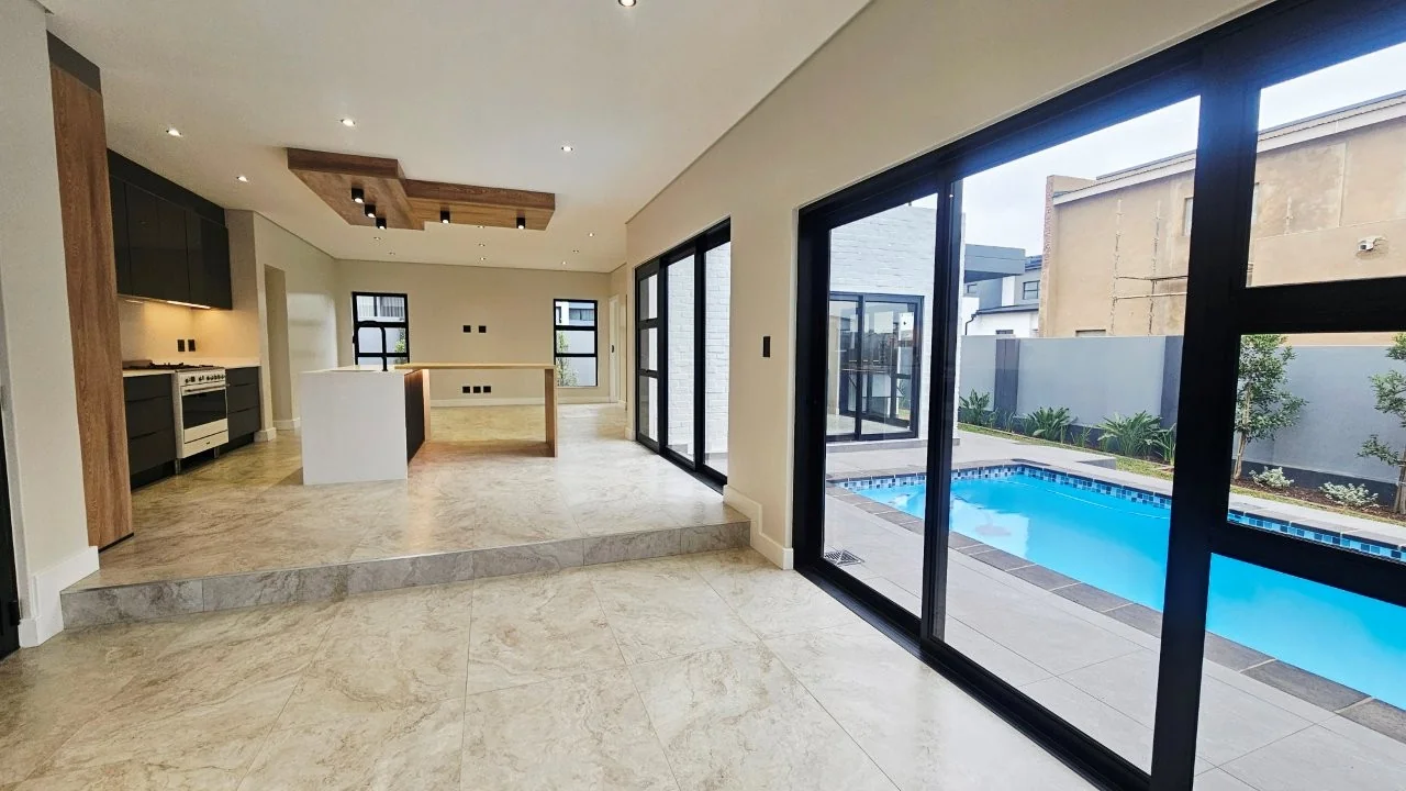 TURNKEY HOME WITH 3 GARAGES  AVAILABLE IN THE NEW DEVELOPING FOUNTAINBROOK ESTATE.