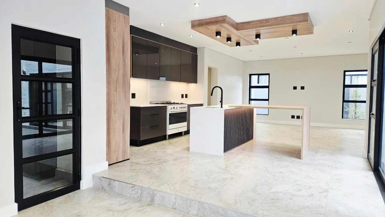TURNKEY HOME WITH 3 GARAGES  AVAILABLE IN THE NEW DEVELOPING FOUNTAINBROOK ESTATE.