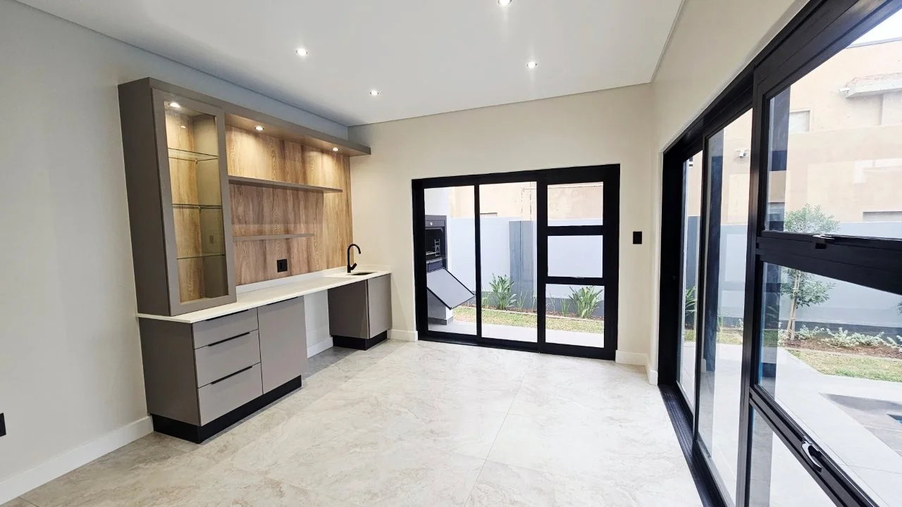 TURNKEY HOME WITH 3 GARAGES  AVAILABLE IN THE NEW DEVELOPING FOUNTAINBROOK ESTATE.