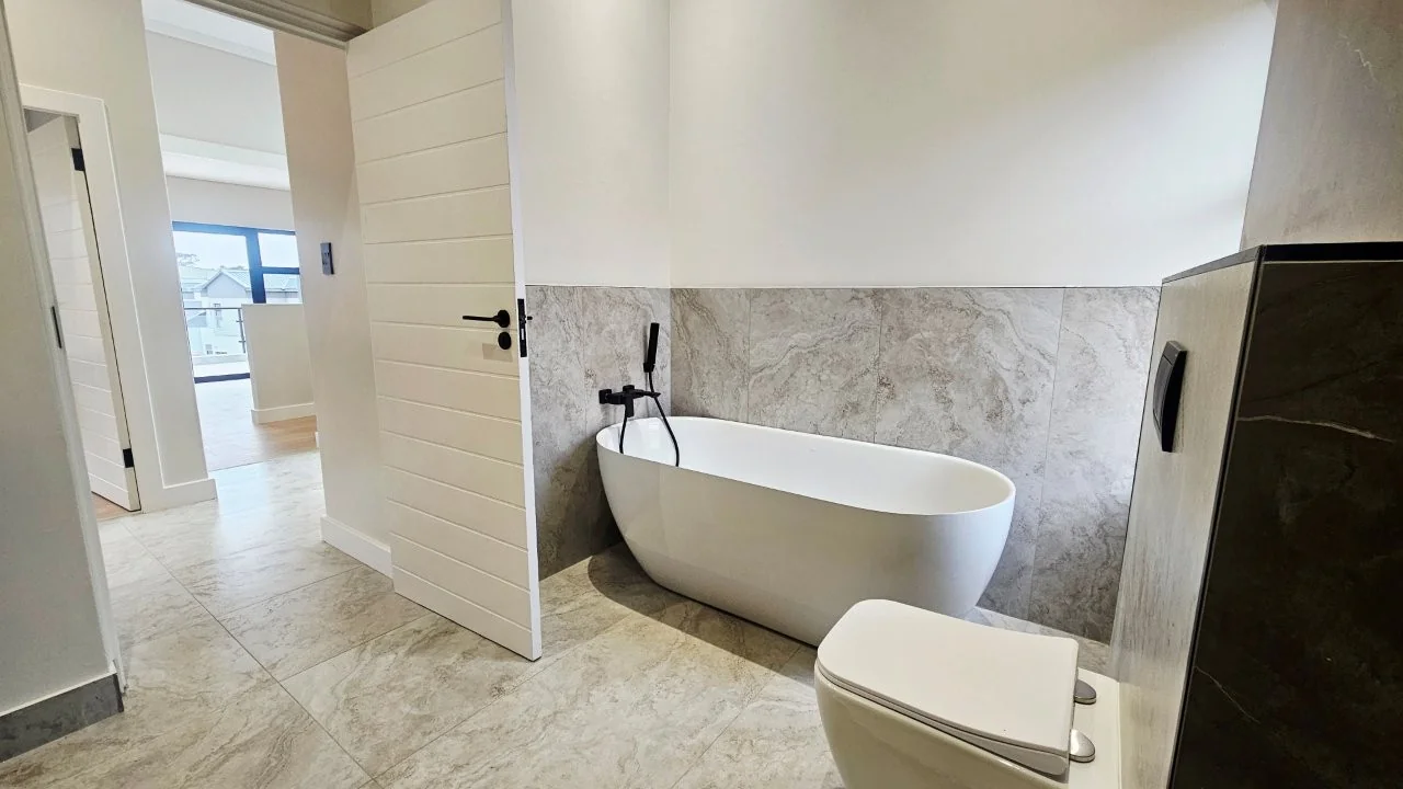 TURNKEY HOME WITH 3 GARAGES  AVAILABLE IN THE NEW DEVELOPING FOUNTAINBROOK ESTATE.