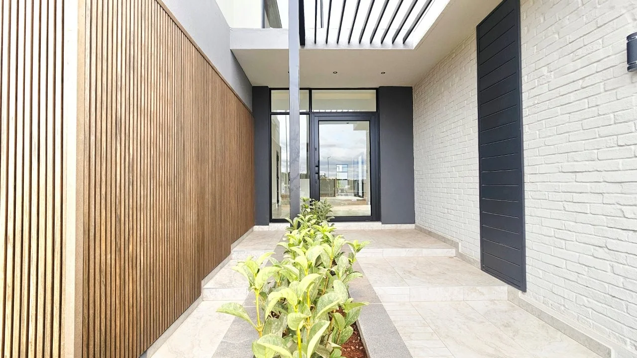 TURNKEY HOME WITH 3 GARAGES  AVAILABLE IN THE NEW DEVELOPING FOUNTAINBROOK ESTATE.