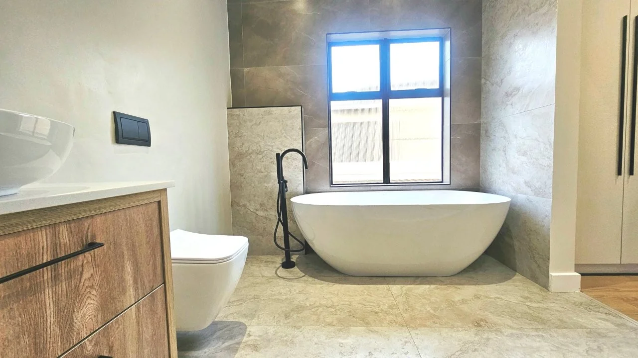 TURNKEY HOME WITH 3 GARAGES  AVAILABLE IN THE NEW DEVELOPING FOUNTAINBROOK ESTATE.