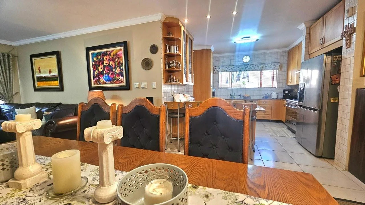 GENEROUS FAMILY HOME WITH FLATLET IN THE HEART OF MIDSTREAM ESTATE.