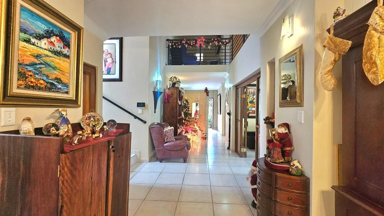 GENEROUS FAMILY HOME WITH FLATLET IN THE HEART OF MIDSTREAM ESTATE.