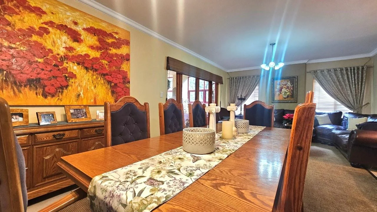 GENEROUS FAMILY HOME WITH FLATLET IN THE HEART OF MIDSTREAM ESTATE.