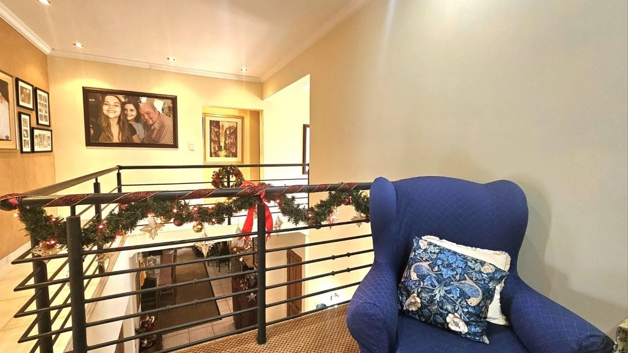 GENEROUS FAMILY HOME WITH FLATLET IN THE HEART OF MIDSTREAM ESTATE.