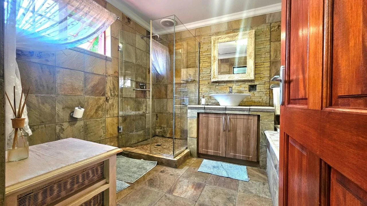 GENEROUS FAMILY HOME WITH FLATLET IN THE HEART OF MIDSTREAM ESTATE.